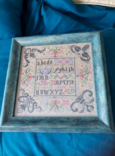 I now have my SAL Sampler by Rosewood Manor framed by Michaels. I love the frame for it.